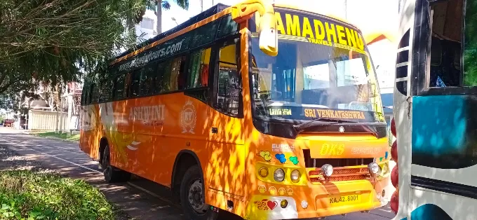 A Kamadhenu bus on the road